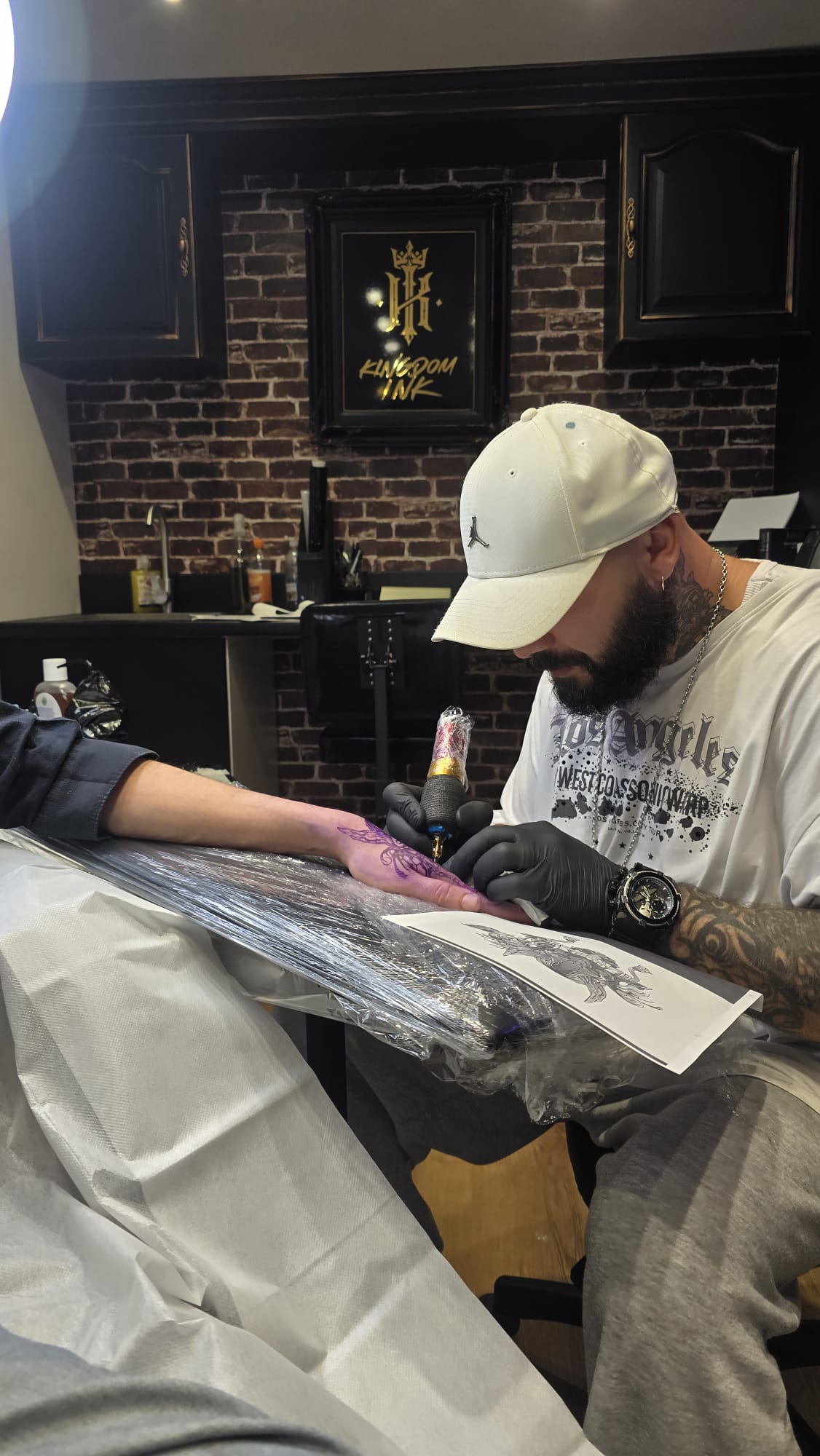 contat kingdom ink tattoo shop
