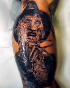 krueger arm tattoo design